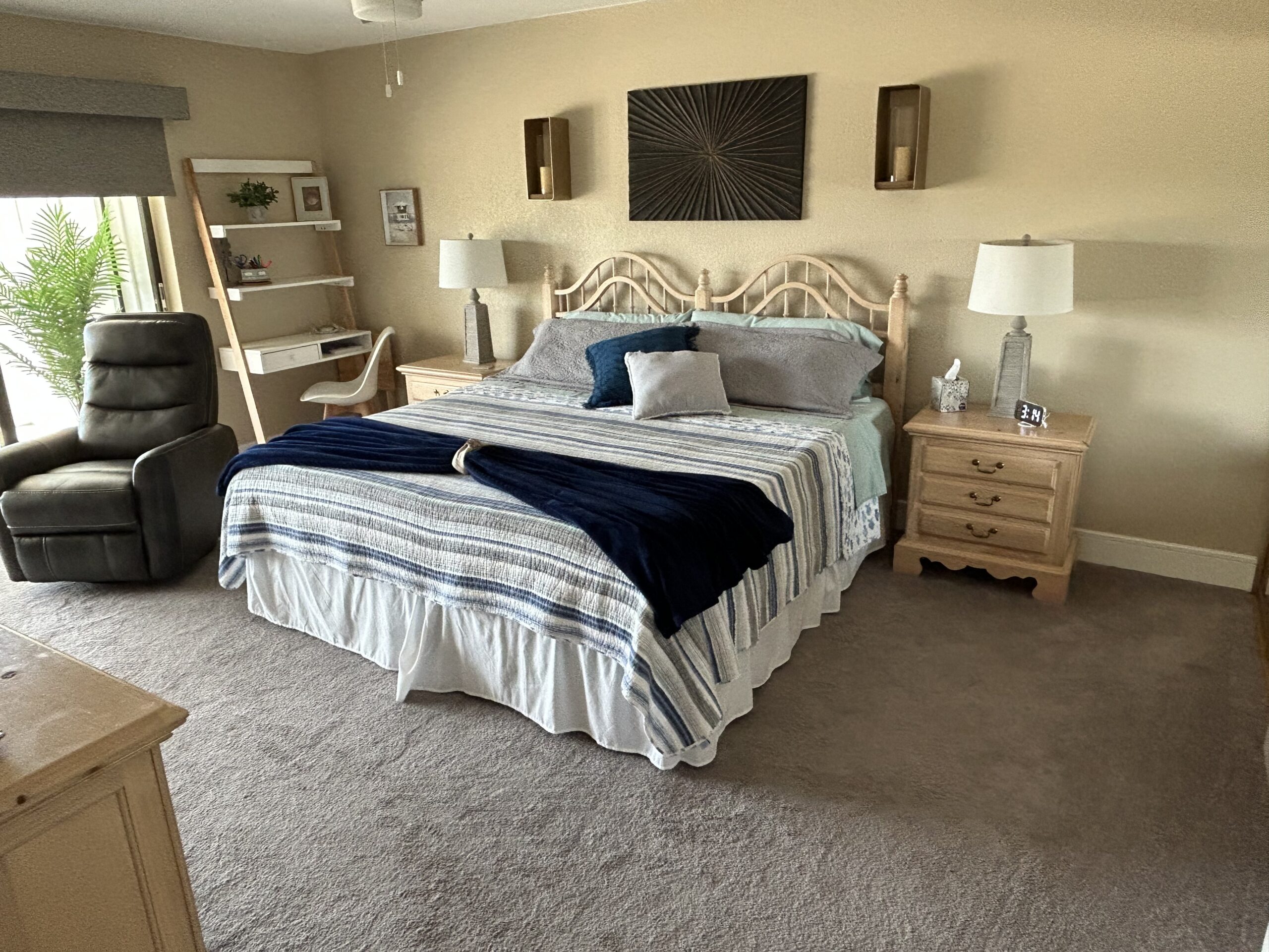 Spacious master bedroom with king bed and cozy décor in Sand Key Clearwater monthly rental condo
